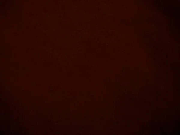 背景にはダークレッドのベルベット生地を使用 柔らかく滑らかな繊維素材の空の濃い赤生地の背景 テキストのスペースがあります — ストック写真