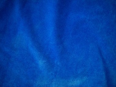 Blue velvet fabric texture used as background. Empty blue fabric background of soft and smooth textile material. There is space for text.	