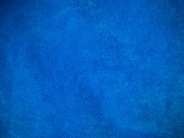 Blue velvet fabric texture used as background. Empty blue fabric background of soft and smooth textile material. There is space for text.	