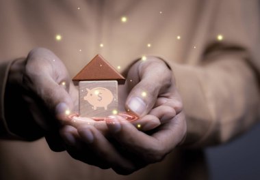 Kişinin ev veya mülkü, tasarruf parası ve finansal konsept, işletme, finans, yatırım, mali planlama.