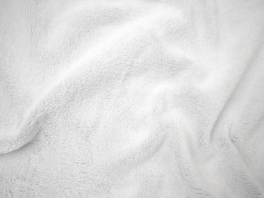 White clean wool texture background. light natural sheep wool. white seamless cotton. texture of fluffy fur for designers. close-up fragment white wool carpet.	