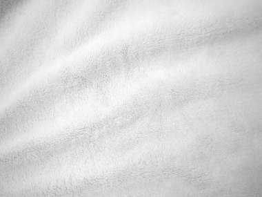 White clean wool texture background. light natural sheep wool. white seamless cotton. texture of fluffy fur for designers. close-up fragment white wool carpet.	