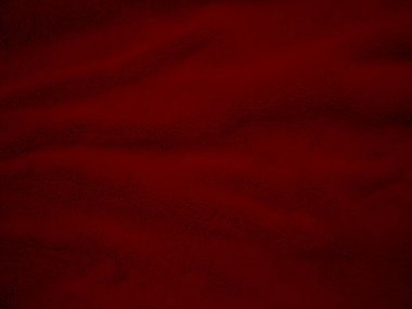 Kırmızı temiz yün dokusu arka planda. hafif doğal koyun yünü. Kırmızı, pürüzsüz pamuk. Tasarımcılar için tüylü kürk dokusu. yakın plan beyaz yün halı...