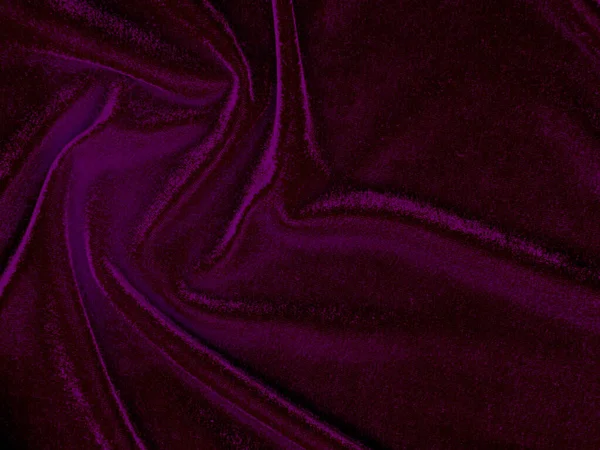 Purple velvet fabric texture used as background. Empty purple fabric background of soft and smooth textile material. There is space for text