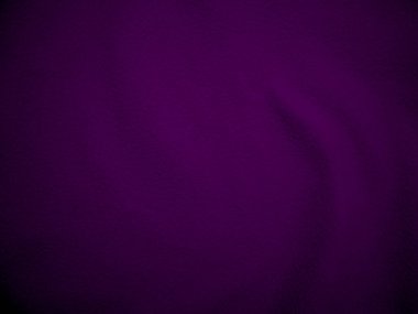 Purple clean wool texture background. light natural sheep wool. serge seamless cotton. texture of fluffy fur for designers. Fabric close up fragment violet flannel haircloth carpet broadcloth.	