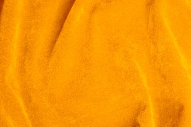 Yellow velvet fabric texture used as background. violet fabric background of soft and smooth textile material. There is space for text.	