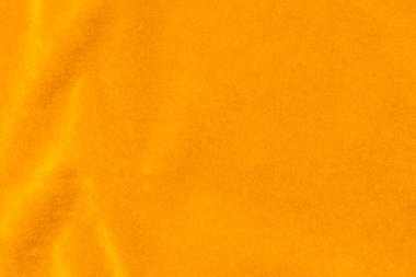 Yellow velvet fabric texture used as background. violet fabric background of soft and smooth textile material. There is space for text.	