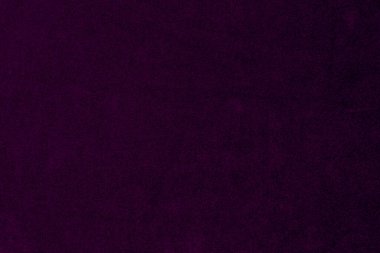 Purple velvet fabric texture used as background. violet fabric background of soft and smooth textile material. There is space for text.	