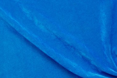 blue velvet fabric texture used as background. blue fabric background of soft and smooth textile material. There is space for text.	