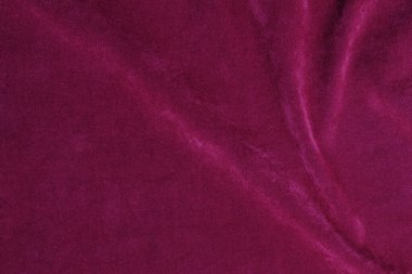 Pink velvet fabric texture used as background. pink fabric background of soft and smooth textile material. There is space for text.	