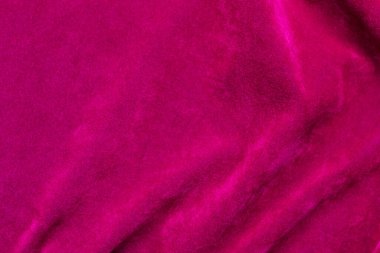 Pink velvet fabric texture used as background. pink fabric background of soft and smooth textile material. There is space for text.	