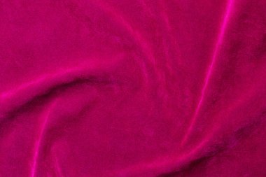 Pink velvet fabric texture used as background. pink fabric background of soft and smooth textile material. There is space for text.	