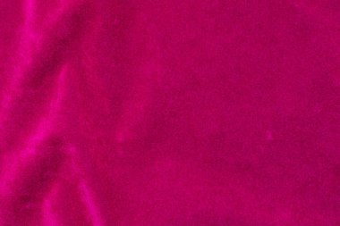 Pink velvet fabric texture used as background. pink fabric background of soft and smooth textile material. There is space for text.	