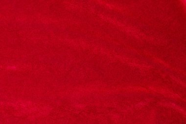 Red velvet fabric texture used as background. red fabric background of soft and smooth textile material. There is space for text.	