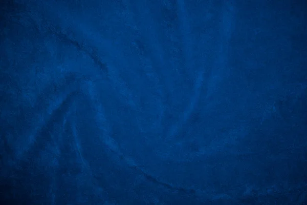 背景にはブルーベルベットの生地を使用 柔らかく滑らかな繊維素材の青い生地の背景 テキストのスペースがあります — ストック写真
