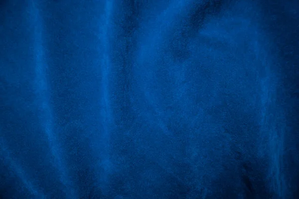 蓝色天鹅绒面料质地为背景 蓝色面料衬底 柔软而光滑的纺织材料 文本是有空间的 — 图库照片