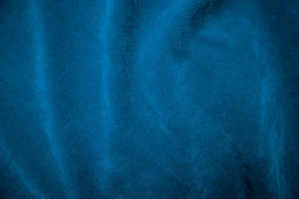 背景には薄青のベルベット生地を使用 柔らかく滑らかな繊維素材の青い生地の背景 テキストのスペースがあります — ストック写真