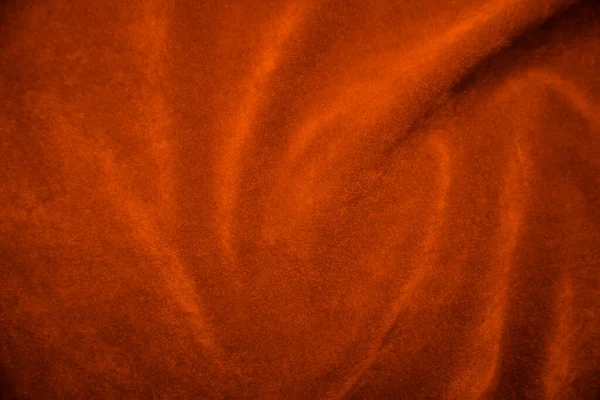 背景として使用されるオレンジベルベット生地のテクスチャ 柔らかく滑らかな繊維素材のオレンジ生地の背景 テキストのスペースがあります — ストック写真