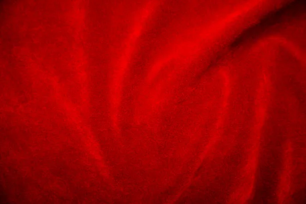 背景として使用される赤いベルベット生地のテクスチャ 柔らかく滑らかな繊維素材の赤い生地の背景 テキストのスペースがあります — ストック写真