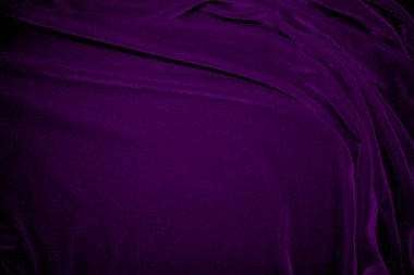 Purple velvet fabric texture used as background. Violet color panne fabric background of soft and smooth textile material. crushed velvet .luxury magenta tone for silk.	