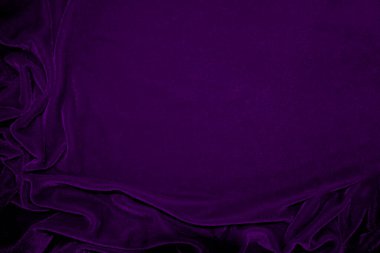 Purple velvet fabric texture used as background. Violet color panne fabric background of soft and smooth textile material. crushed velvet .luxury magenta tone for silk.	