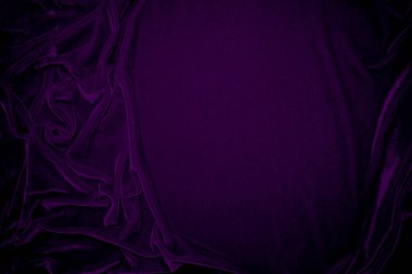 Purple velvet fabric texture used as background. Violet color panne fabric background of soft and smooth textile material. crushed velvet .luxury magenta tone for silk.	