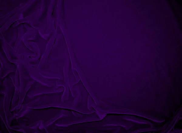 Purple velvet fabric texture used as background. Violet color panne fabric background of soft and smooth textile material. crushed velvet .luxury magenta tone for silk.