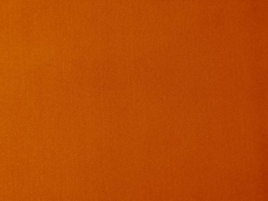 Orange velvet fabric texture used as background. orange fabric background of soft and smooth textile material. There is space for text.	