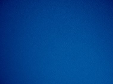 Felt blue soft rough textile material background texture close up,poker table,tennis ball,table cloth. Empty navy blue fabric denim background.