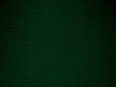 Green velvet fabric texture used as background. Peacock color panne fabric background of soft and smooth textile material. crushed velvet .luxury emerald tone for silk.	