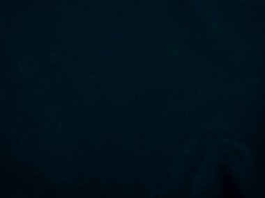 Blue velvet fabric texture used as background. Peacock color panne fabric background of soft and smooth textile material. crushed velvet .luxury navy tone for silk.	