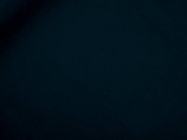 Blue velvet fabric texture used as background. Peacock color panne fabric background of soft and smooth textile material. crushed velvet .luxury navy tone for silk.	