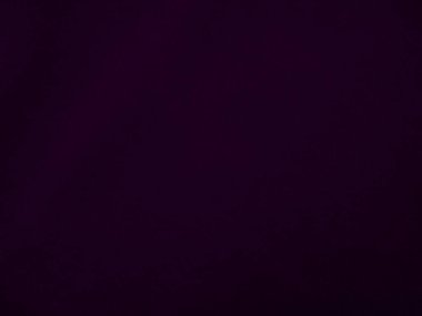 Dark purple velvet fabric texture used as background. Violet color panne fabric background of soft and smooth textile material. crushed velvet .luxury magenta tone for silk.	