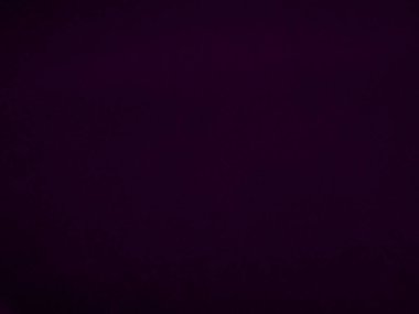 Dark purple velvet fabric texture used as background. Violet color panne fabric background of soft and smooth textile material. crushed velvet .luxury magenta tone for silk.	