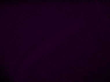 Dark purple velvet fabric texture used as background. Violet color panne fabric background of soft and smooth textile material. crushed velvet .luxury magenta tone for silk.	