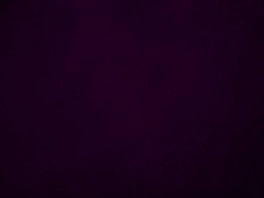Dark purple velvet fabric texture used as background. Violet color panne fabric background of soft and smooth textile material. crushed velvet .luxury magenta tone for silk.	