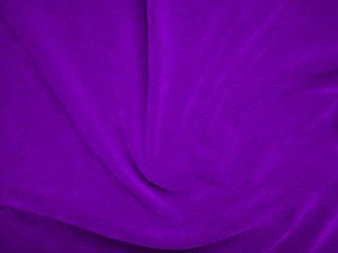 Purple velvet fabric texture used as background. Violet color panne fabric background of soft and smooth textile material. crushed velvet .luxury magenta tone for silk.	