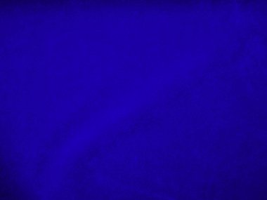Dark blue velvet fabric texture used as background. Sky color panne fabric background of soft and smooth textile material. crushed velvet .luxury cobalt tone for silk.	