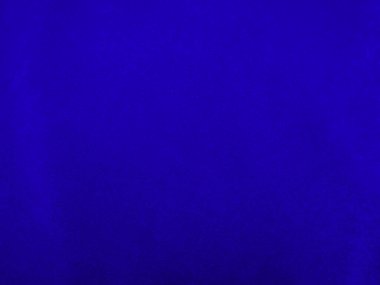 Dark blue velvet fabric texture used as background. Sky color panne fabric background of soft and smooth textile material. crushed velvet .luxury cobalt tone for silk.	