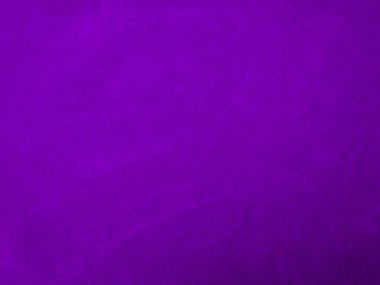 Purple velvet fabric texture used as background. Violet color panne fabric background of soft and smooth textile material. crushed velvet .luxury magenta tone for silk.	
