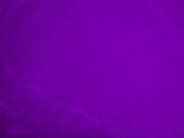 Purple velvet fabric texture used as background. Violet color panne fabric background of soft and smooth textile material. crushed velvet .luxury magenta tone for silk.	