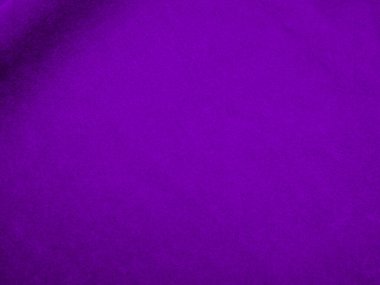 Purple velvet fabric texture used as background. Violet color panne fabric background of soft and smooth textile material. crushed velvet .luxury magenta tone for silk.	