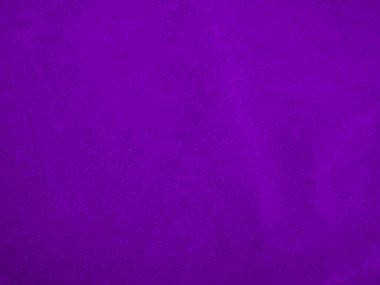 Purple velvet fabric texture used as background. Violet color panne fabric background of soft and smooth textile material. crushed velvet .luxury magenta tone for silk.	