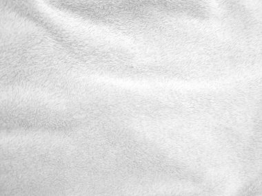 White clean wool texture background. light natural sheep wool. white seamless cotton. texture of fluffy fur for designers. close-up fragment white wool carpet.	