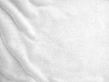 White clean wool texture background. light natural sheep wool. white seamless cotton. texture of fluffy fur for designers. close-up fragment white wool carpet.	