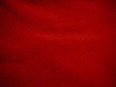 Kırmızı, temiz yün dokusu arka plan. hafif doğal koyun yünü. Kırmızı, dikişsiz pamuk. Tasarımcılar için tüylü kürk dokusu. yakın plan kırmızı yün halı..