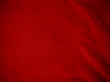 Kırmızı, temiz yün dokusu arka plan. hafif doğal koyun yünü. Kırmızı, dikişsiz pamuk. Tasarımcılar için tüylü kürk dokusu. yakın plan kırmızı yün halı..