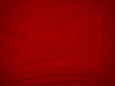 Kırmızı, temiz yün dokusu arka plan. hafif doğal koyun yünü. Kırmızı, dikişsiz pamuk. Tasarımcılar için tüylü kürk dokusu. yakın plan kırmızı yün halı..