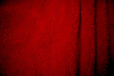 Kırmızı, temiz yün dokusu arka plan. hafif doğal koyun yünü. Beyaz, pürüzsüz pamuk. Tasarımcılar için tüylü kürk dokusu. Yakın plan beyaz yün halı. Keçi tüyü