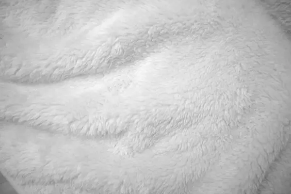 白いきれいなウールの質の背景 ライトナチュラルシープウール ホワイトシームレスコットン デザイナーのためのふわふわの毛皮の質 クローズアップフラグメントホワイトウールカーペット ヤギの毛 — ストック写真